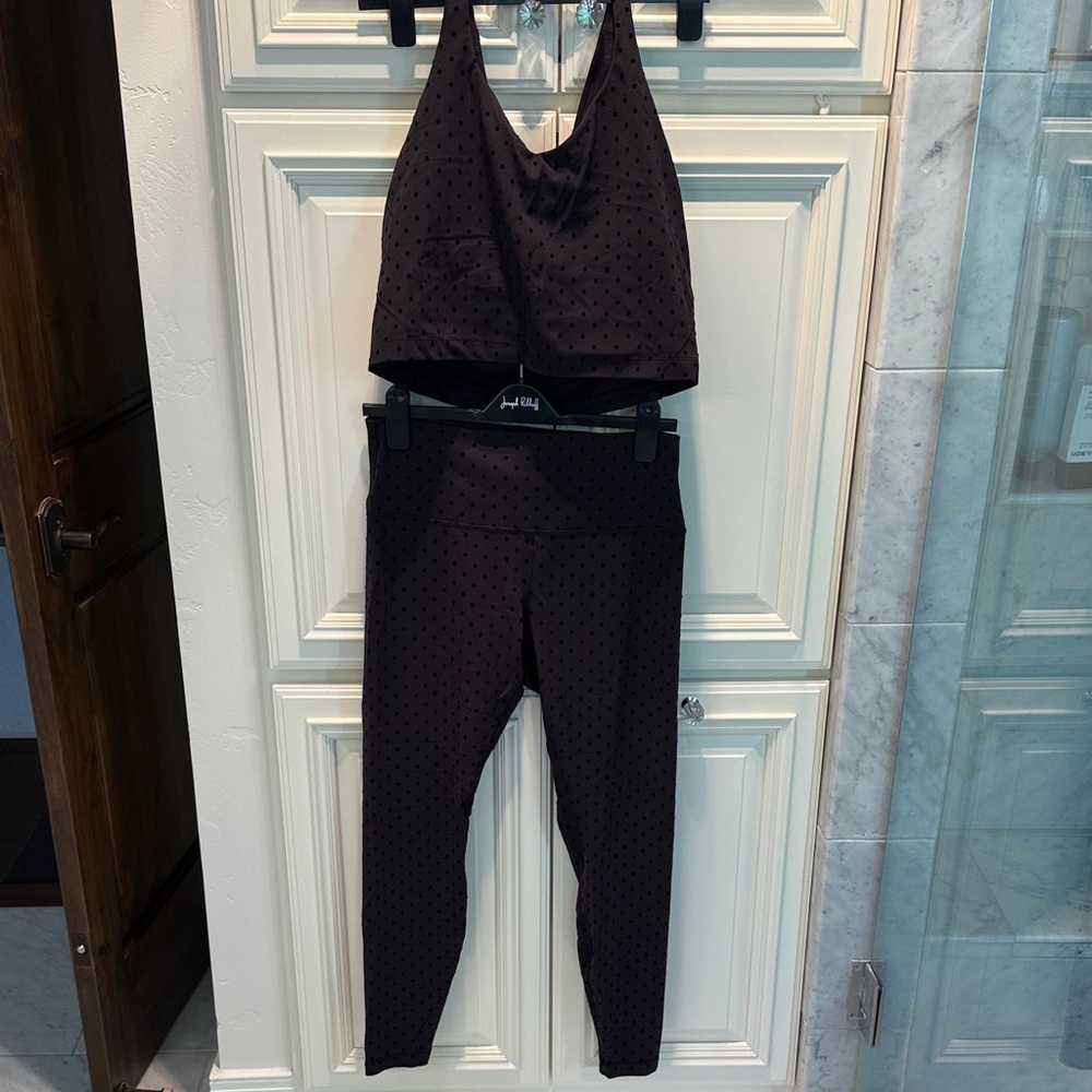 Lululemon Black Polka Dot leggings (12) & sports bra (14)—viral matching set.